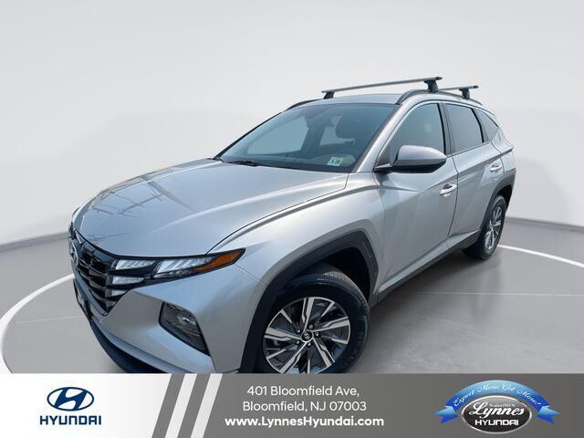 2024 Hyundai TUCSON Hybrid Blue — photo 1 of 13