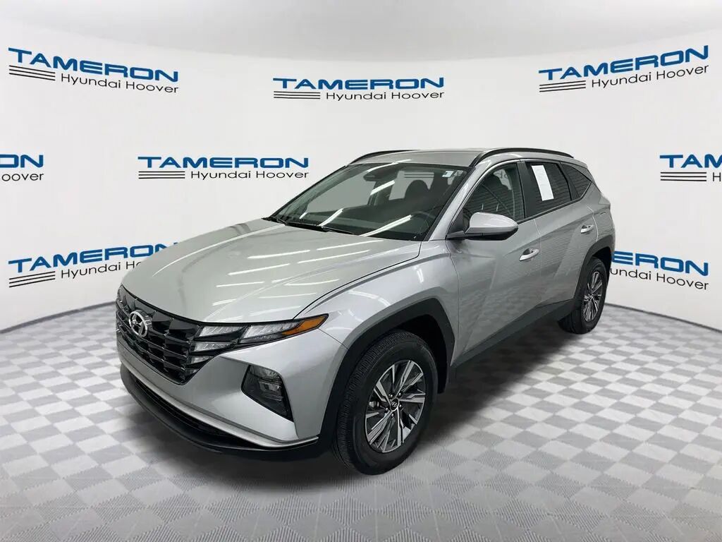 2024 Hyundai TUCSON Hybrid Blue — photo 1 of 13