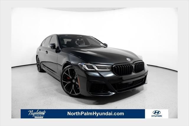 2023 BMW 5 Series M550i xDrive — photo 1 of 13