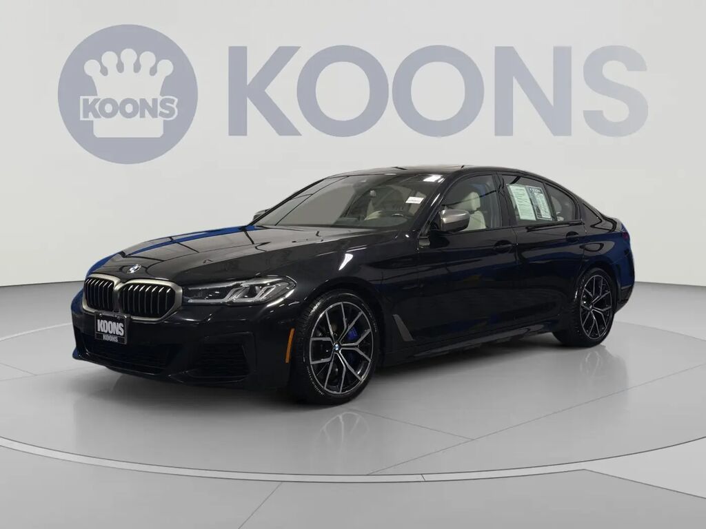 2023 BMW 5 Series M550i xDrive — photo 1 of 13