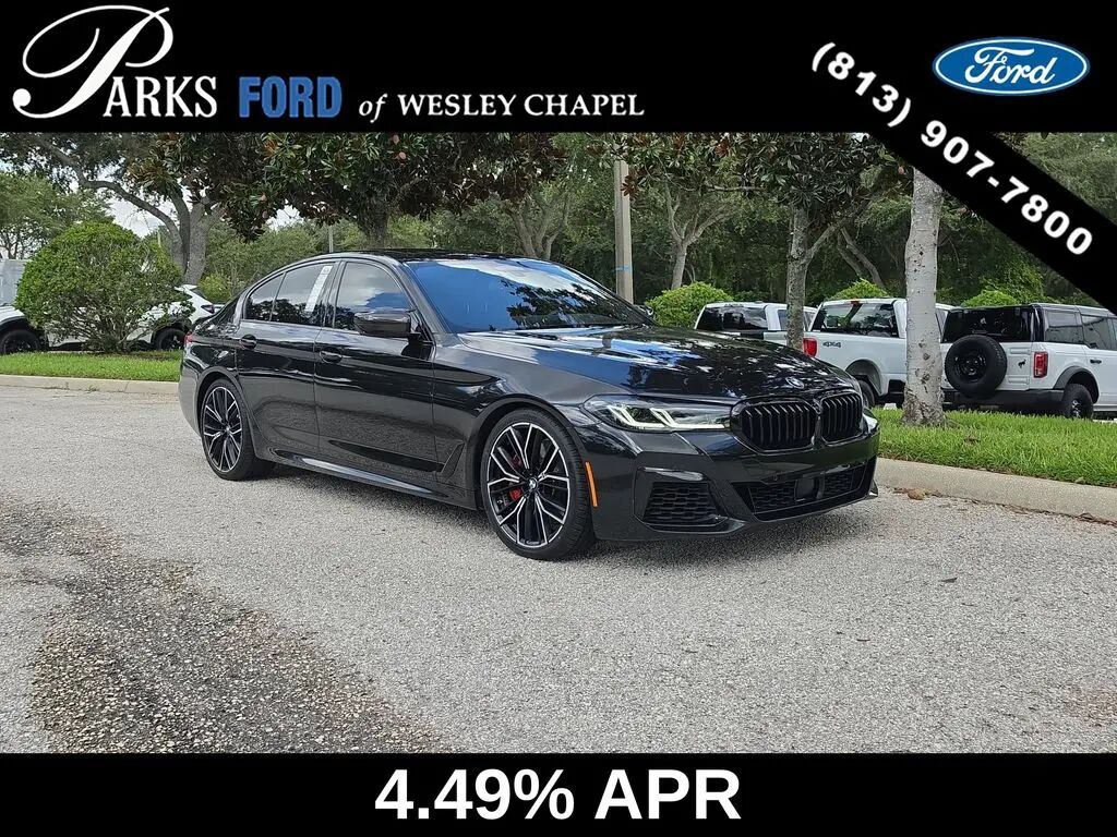 2021 BMW 5 Series M550i xDrive — photo 1 of 13